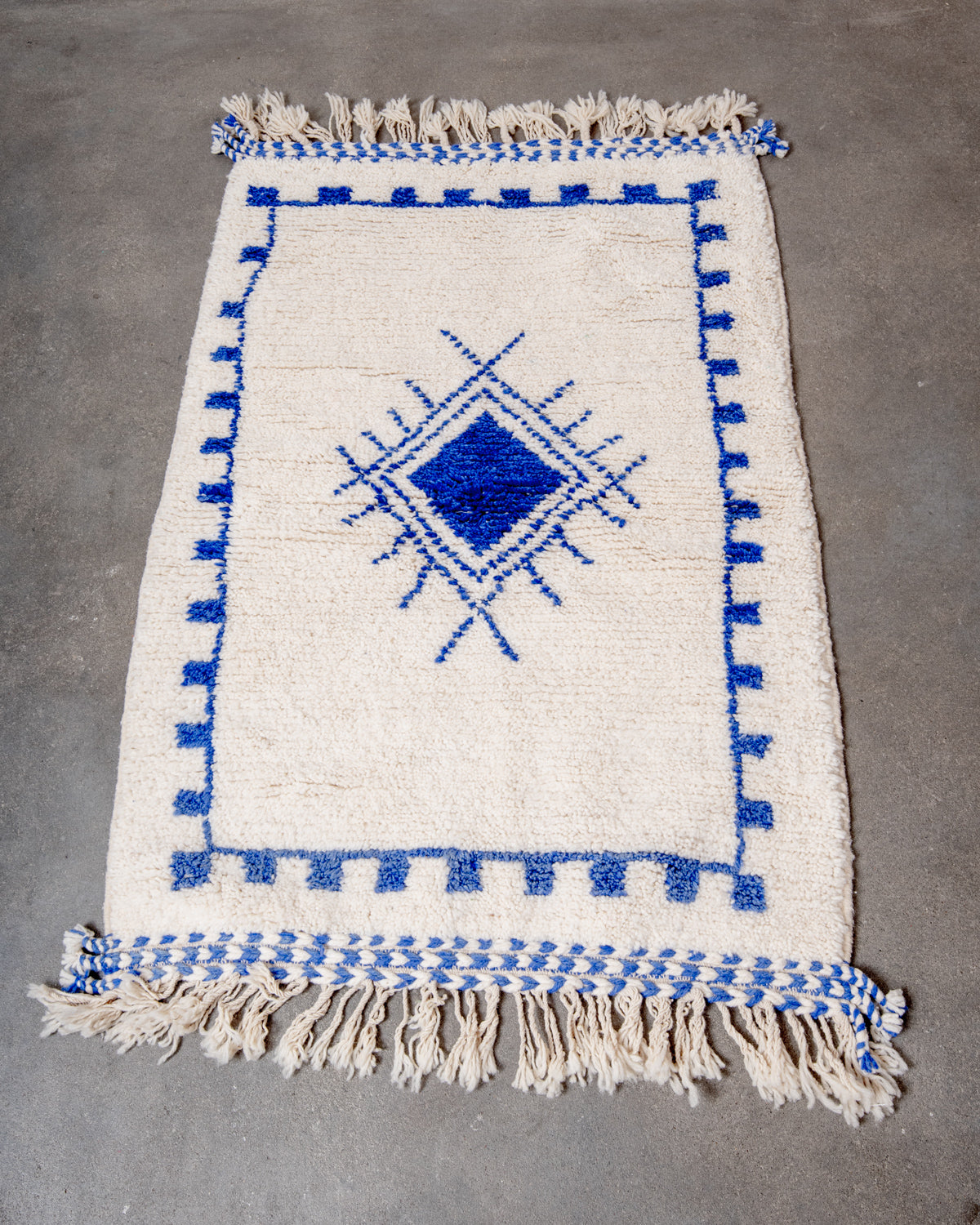 Modern, designer, handcrafted Berber rug from Morocco. Beniourain carpet with beautiful colours and patterns and fluffy wool texture.